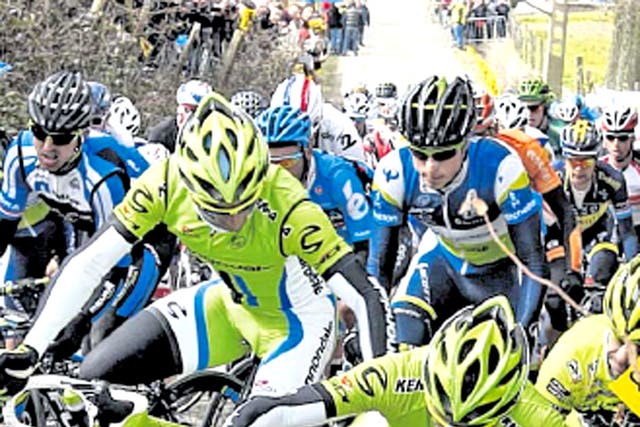 Riders become tangled up during the Tour of Flanders