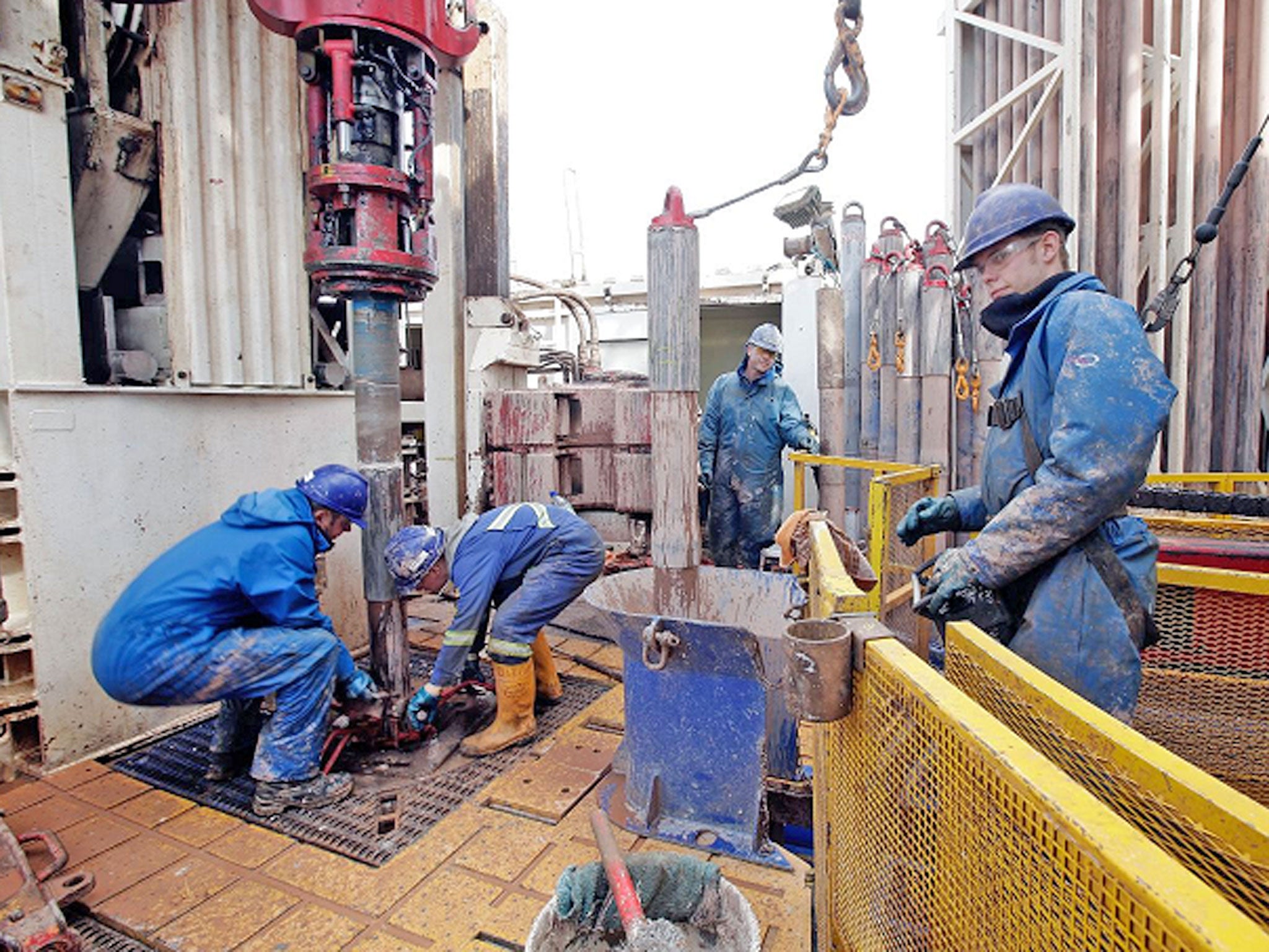 Engineers working on the drilling platform of the Cuadrilla shale fracking facility in Preston, Lancashire