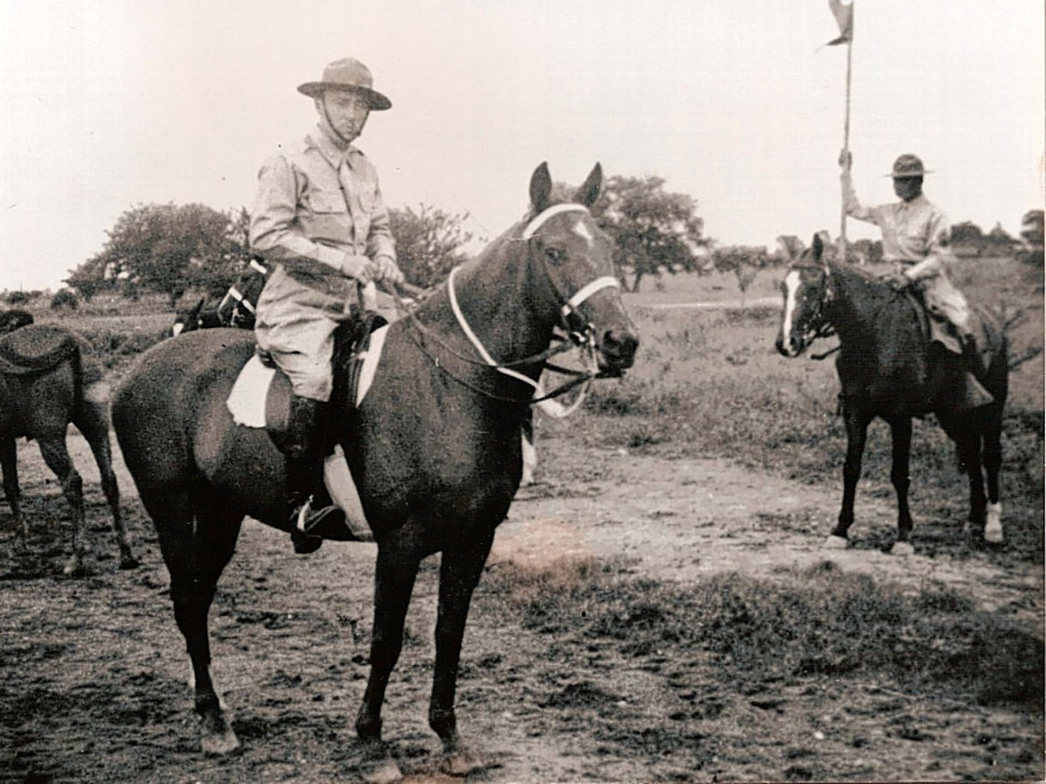 Ramsey, left, on Bryn Awryn in 1941, the year before they charged the Japanese in the Philippines