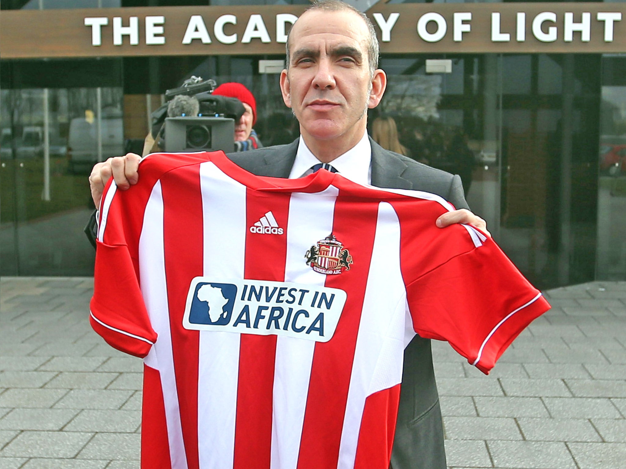 Paolo Di Canio poses with a club shirt after being unveiled as the new Sunderland manager