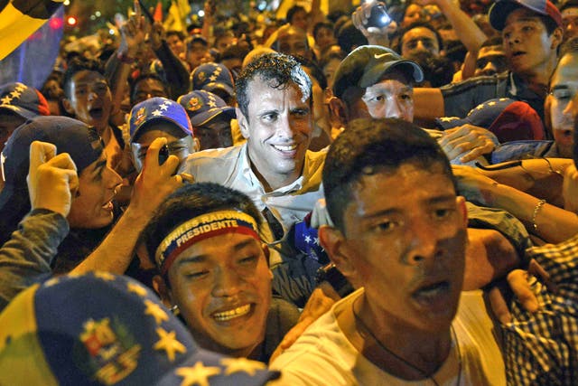 The opposition candidate Henrique Capriles at an antiviolence protest on Monday