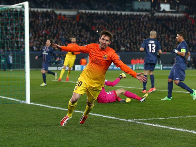 Barcelona forward Lionel Messi scores against PSG in the Champions League