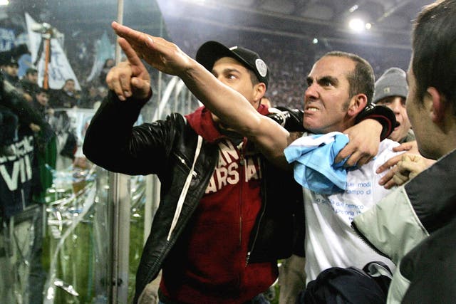 Paolo Di Canio gestures towards fans during his time at Lazio