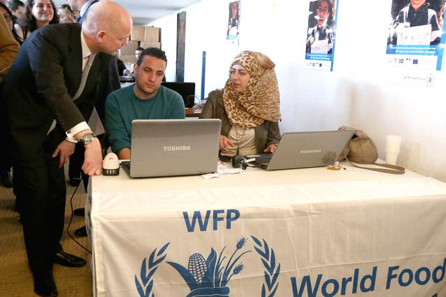 British Foreign Secretary William Hague visiting a World Food Programme Center on the outskirts of Beirut earlier this year