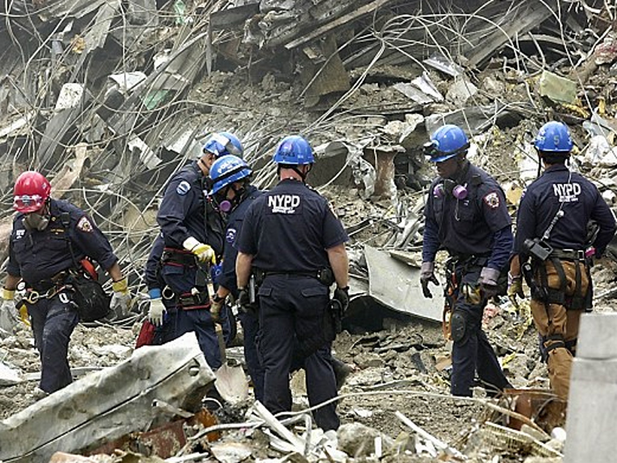Investigators began sifting through debris from the World Trade Center site on Monday
