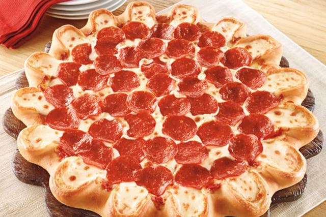 Pizza Hut's new pizza has handmade pockets of molten mozzarella, provolone, fontina, mild cheddar and other cheeses around the rim.