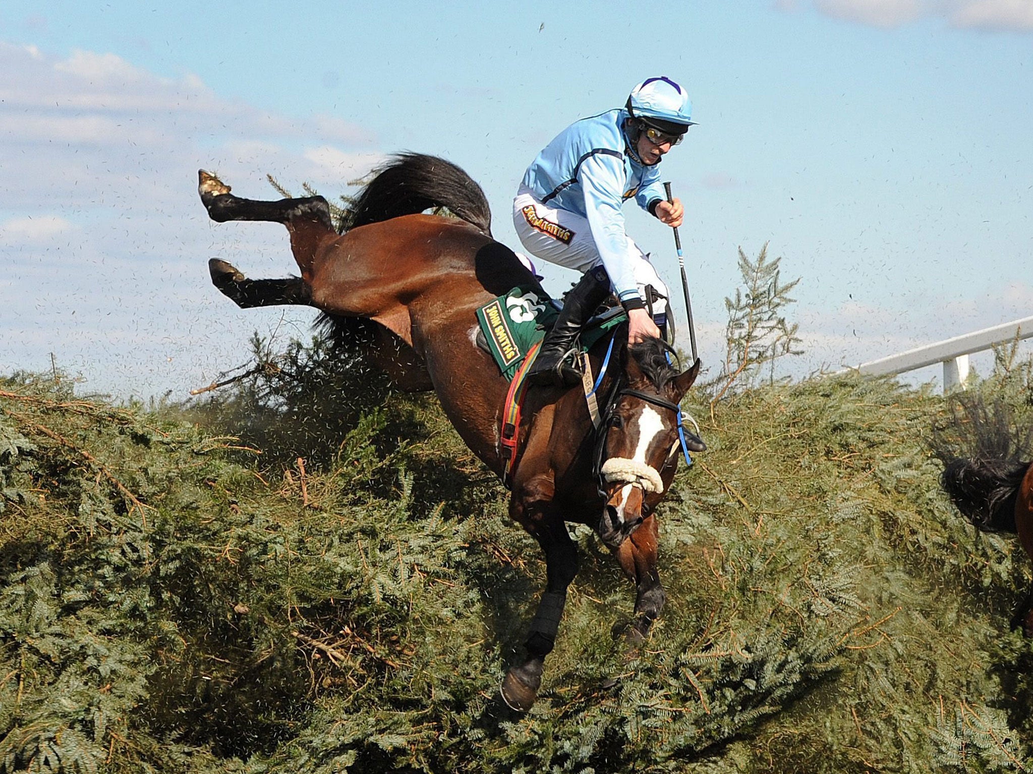 Ireland’s Stuart Crawford takes a tumble with Mourne Paddy at the Chair during the John Smith’s Fox Hunters’ Chase