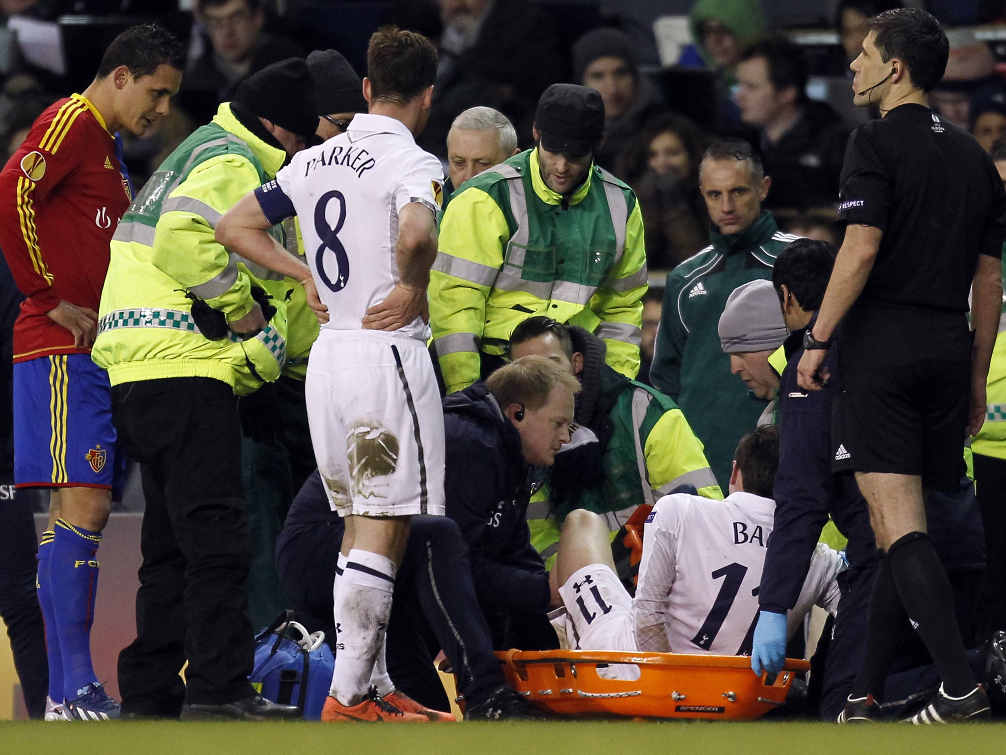 Tottenham forward Gareth Bale is stretchered off against Basel