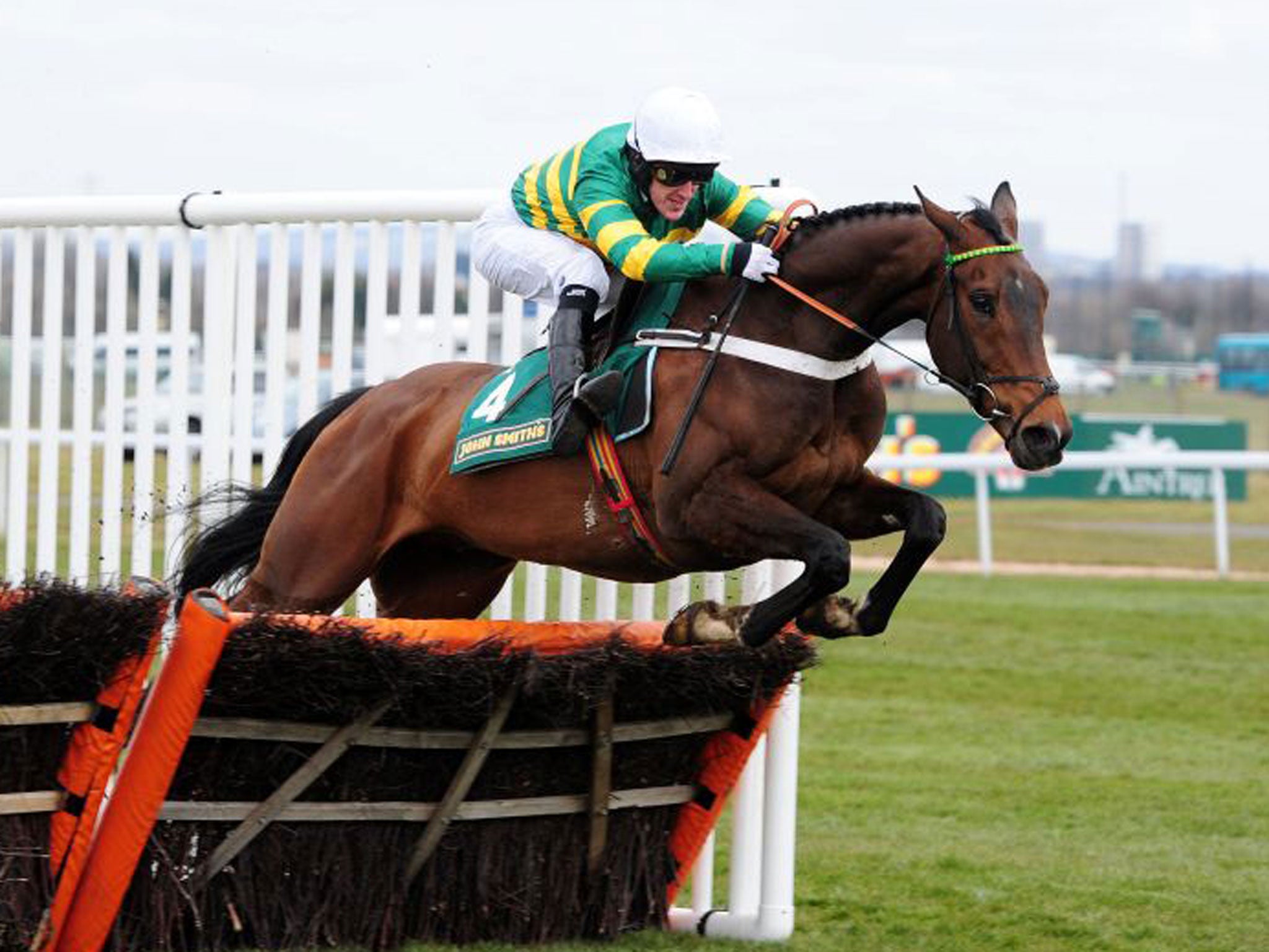 My Tent Or Yours, under A P McCoy, wins the Novices Hurdle