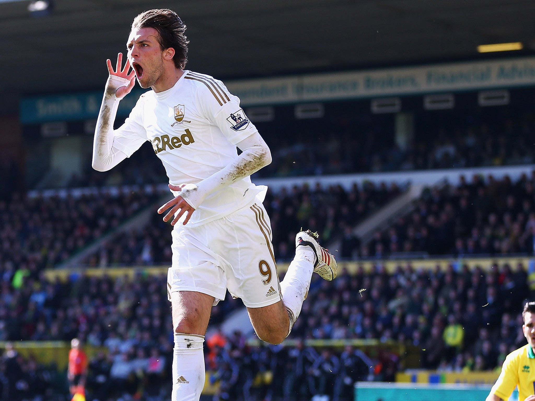 Michu celebrates his goal for Swansea