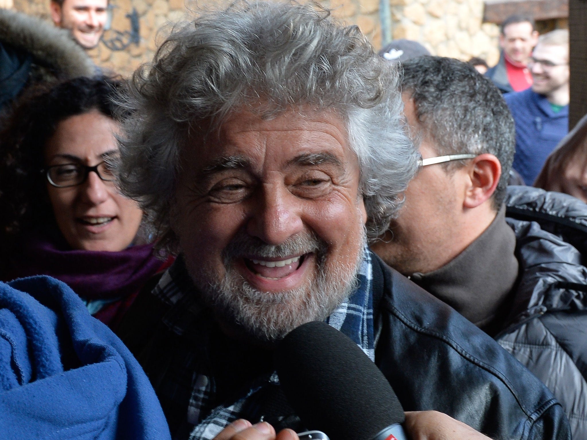 Odd couple: Beppe Grillo enjoys the limelight, whereas his partner, Gianroberto Casaleggio, is more elusive
