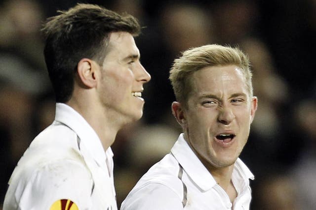 Missing link: Gareth Bale (left) is out for at least two games; Lewis Holtby is one of those in line to replace him