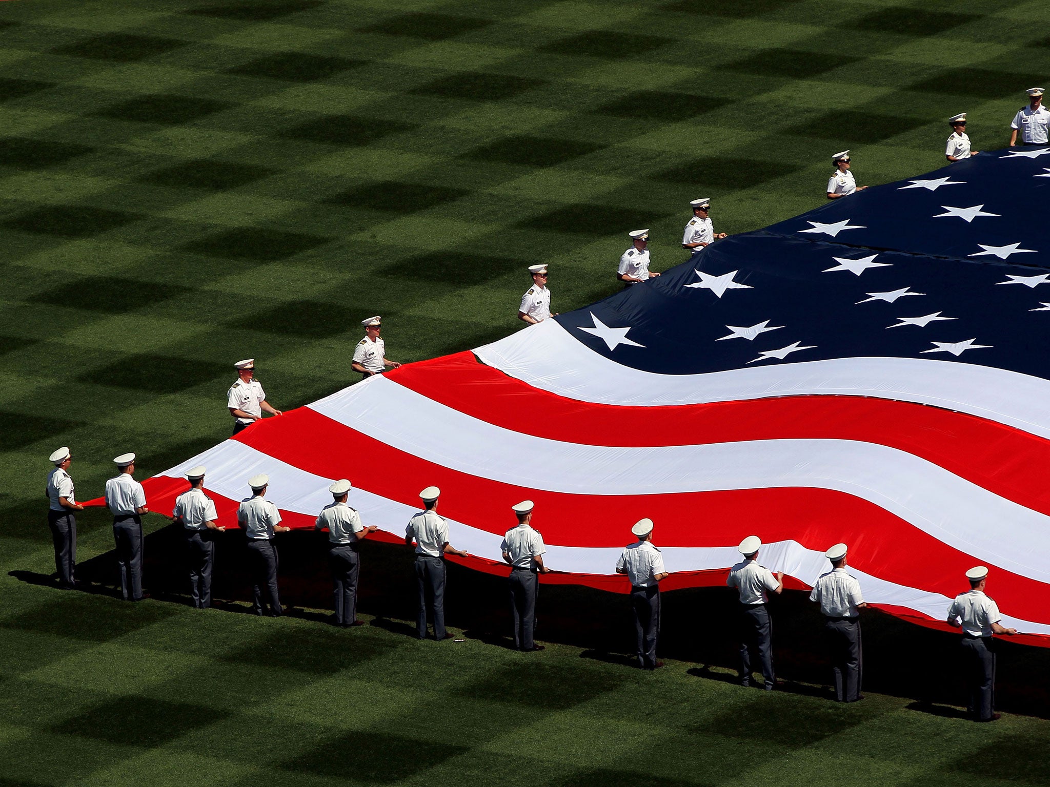 A giant American Flag in displayed in centerfield prior to the New York Yankees home opener against the Los Angeles Angels on April 13, 2012 in the Bronx borough of New York City.