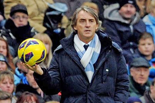 Roberto Mancini faces a defining week in his career at City