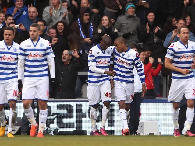 Loic Remy celebrates after scoring for QPR against Wigan