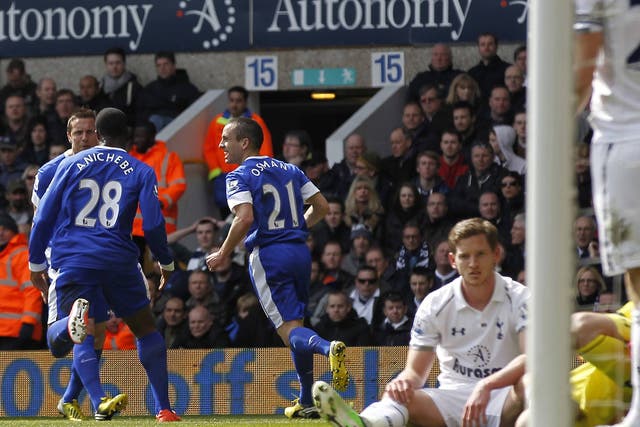  Phil Jagielka of Everton celebrates after scoring against Tottenham