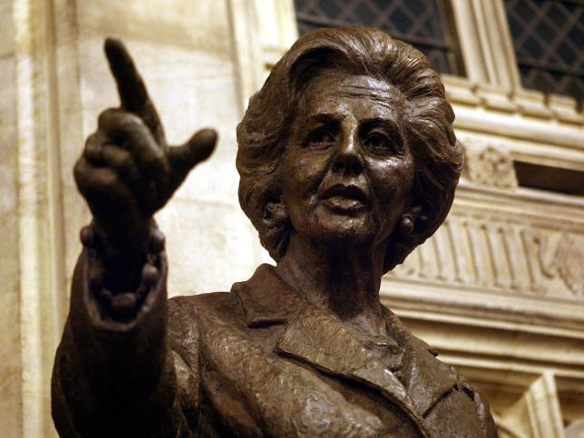 A bronze statue of former British Prime Minister Baroness Margaret Thatcher inside the Palace of Westminster