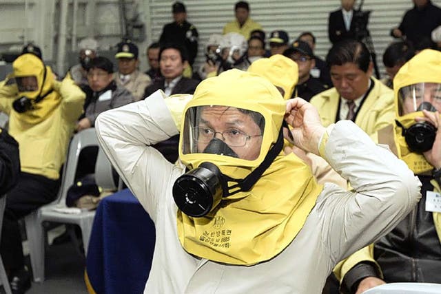 A civil defence drill at a navy base in Pyeongtaek, south of Seoul, yesterday. Around 500 South Koreans are still at the Kaesong industrial complex