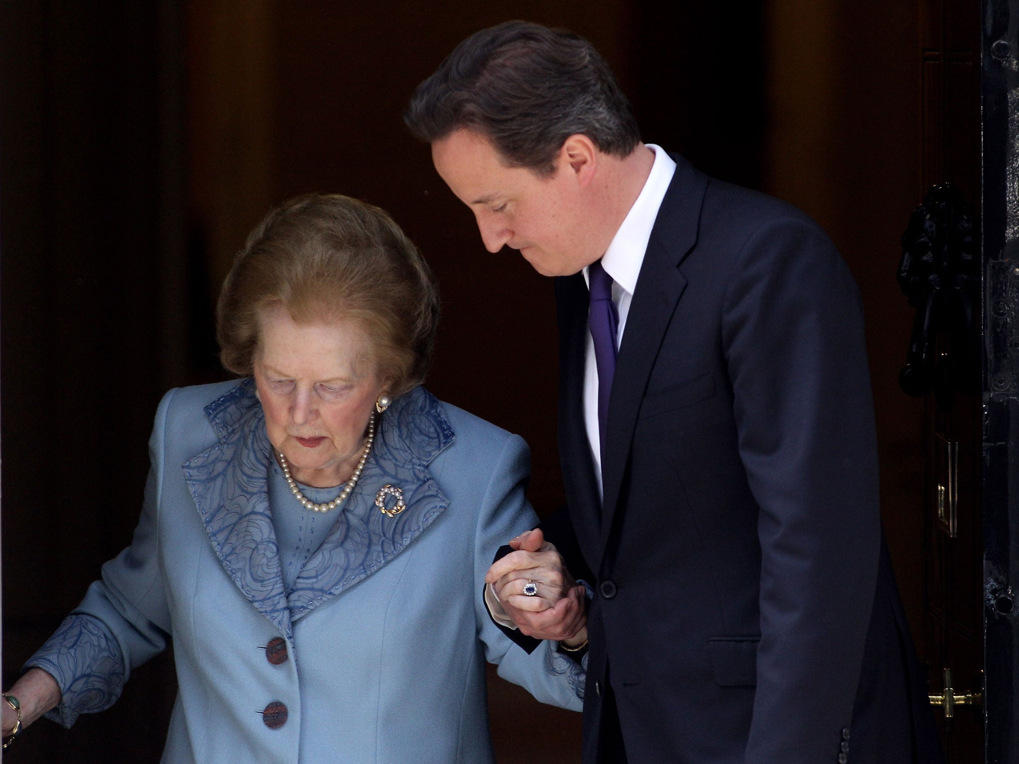 British Prime Minister David Cameron and former Prime Minister Baroness Thatcher leave from Number 10 Downing Street following her visit on June 8, 2010 in London, England.