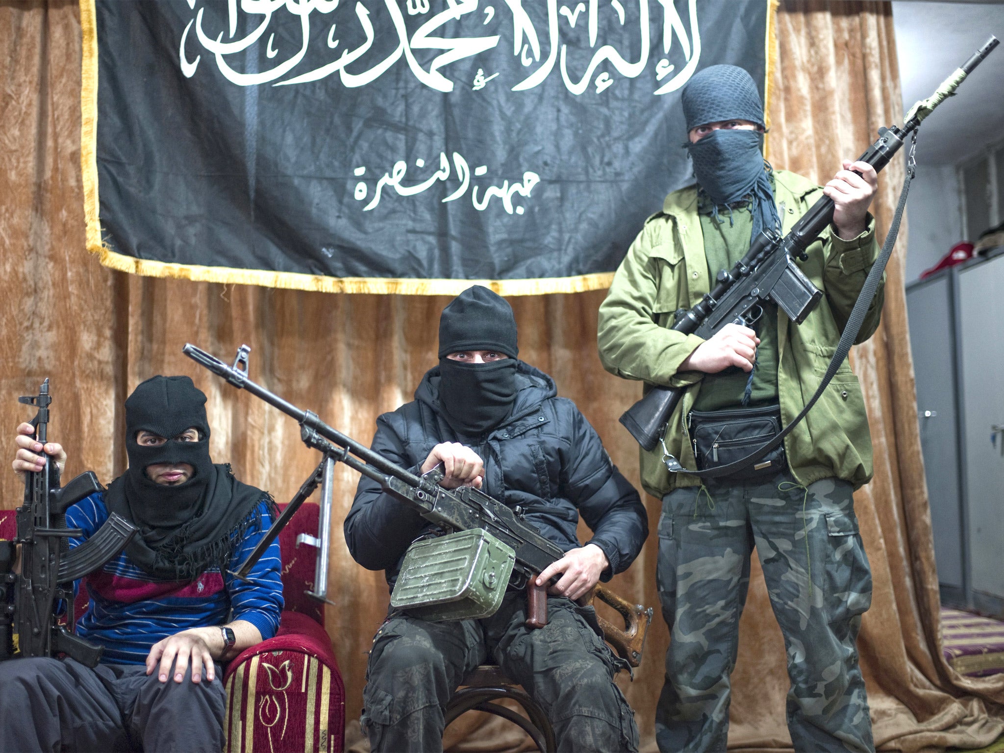 Members of the al-Nusra Front in the besieged city of Deir Ezzor in eastern Syria