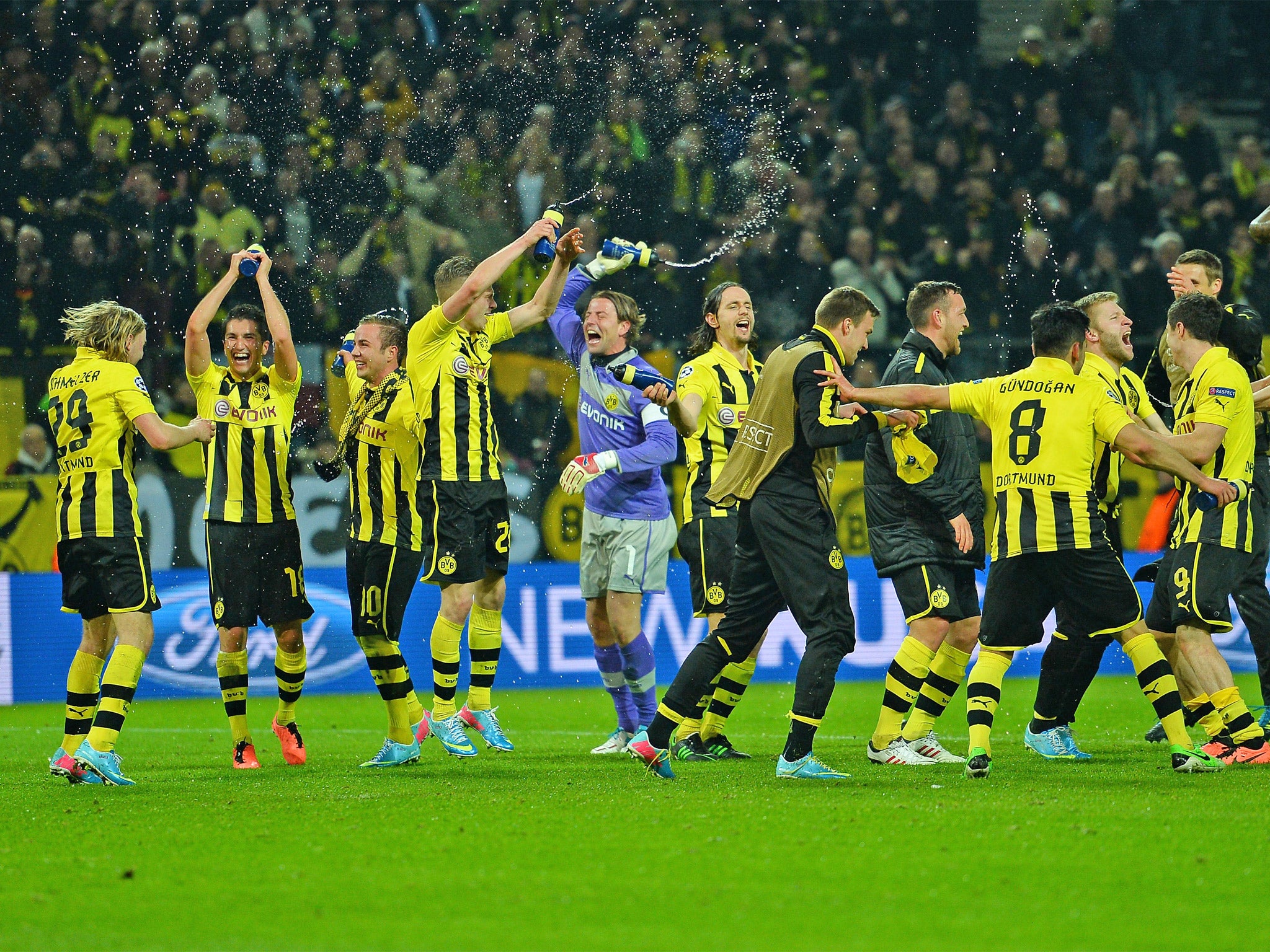 Borussia Dortmund players celebrate their last-gasp victory