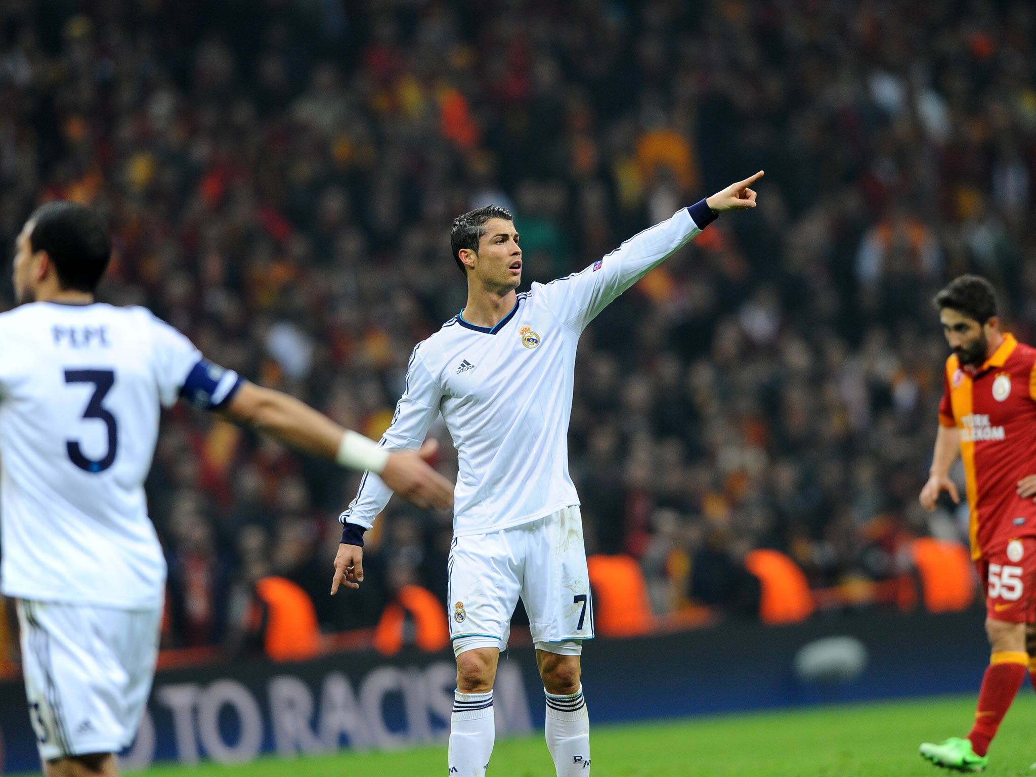 Cristiano Ronaldo celebrates one of his two goals for Real Madrid in their Champions League tie against Galatasaray