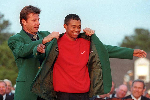 Tiger Woods claims his first Green Jacket in 1997