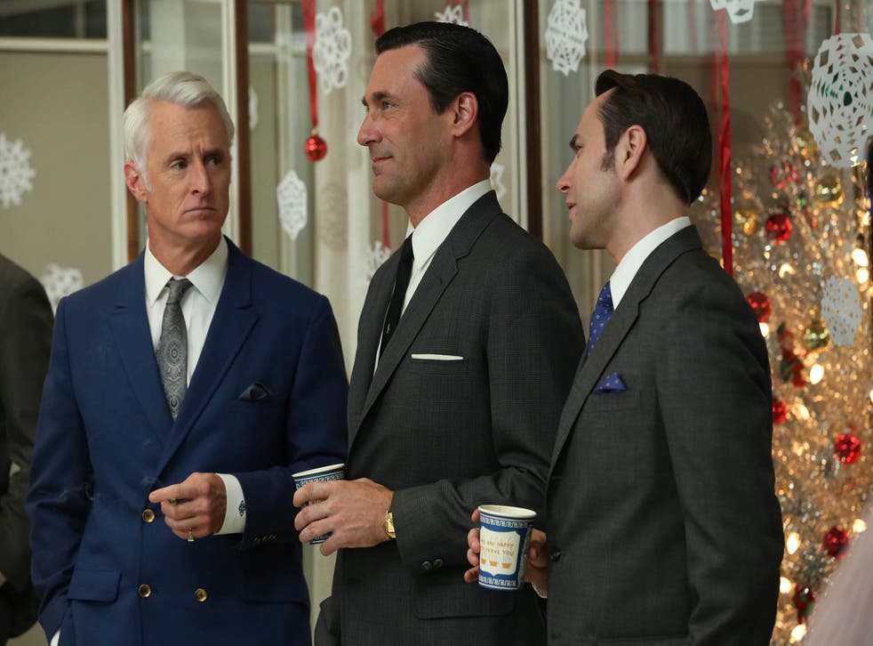 John Slattery as Roger Sterling, left, Jon Hamm as Don Draper, center, and Vincent Kartheiser as Pete Campbell in a scene from the season six premiere of 'Mad Men'