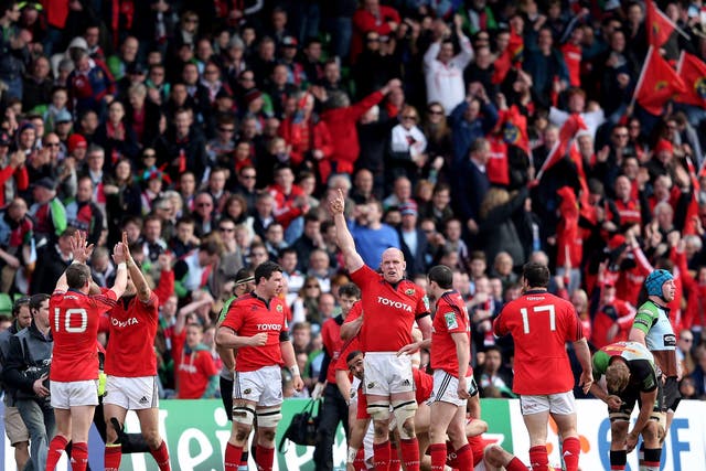 Munster celebrate during their victory over Quins