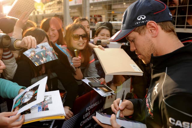 Sebastian Vettel signs autographs in China