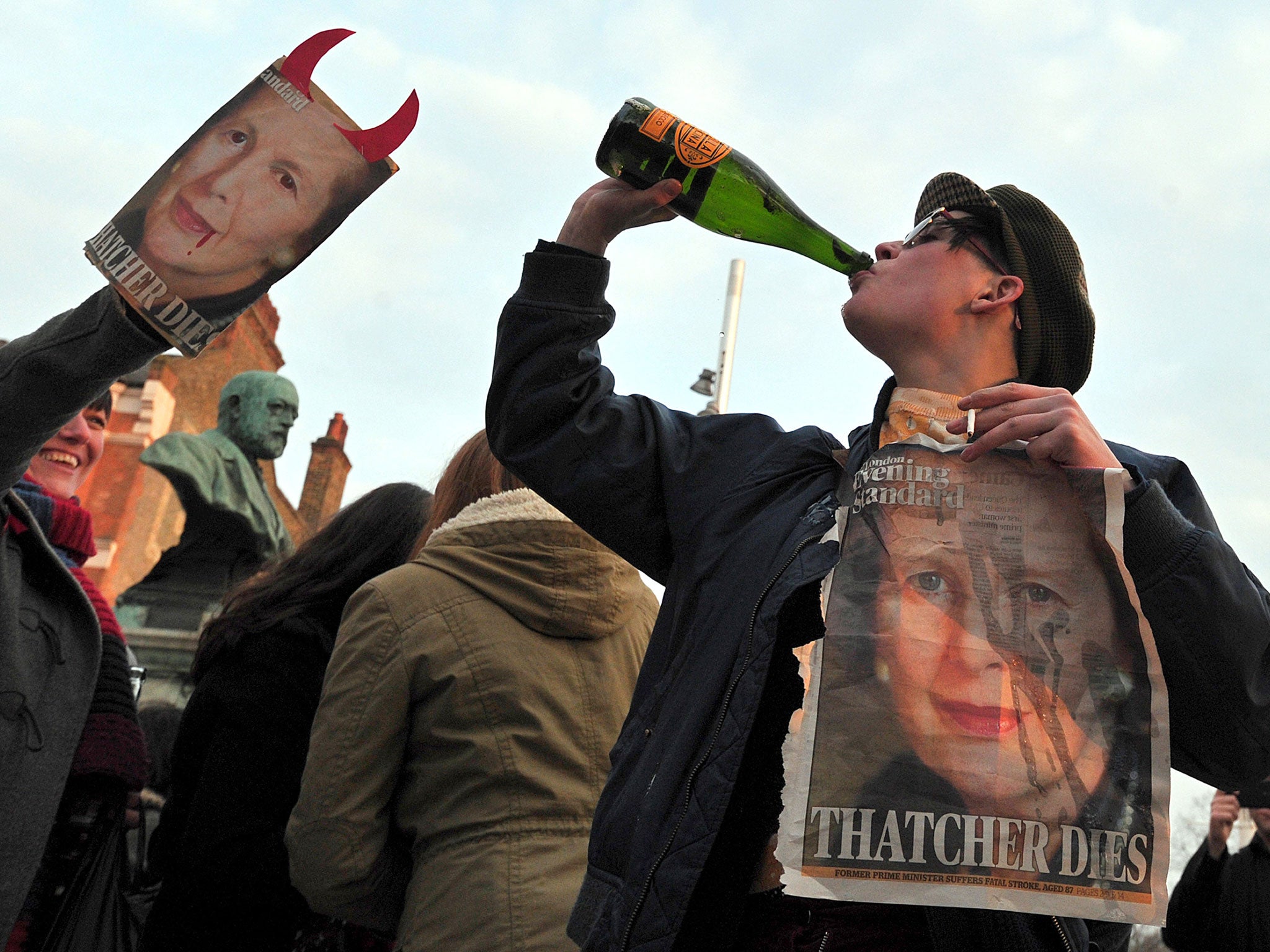 People gather during a 'party' to celebrate the death of former British Prime Minister Margaret Thatcher in London