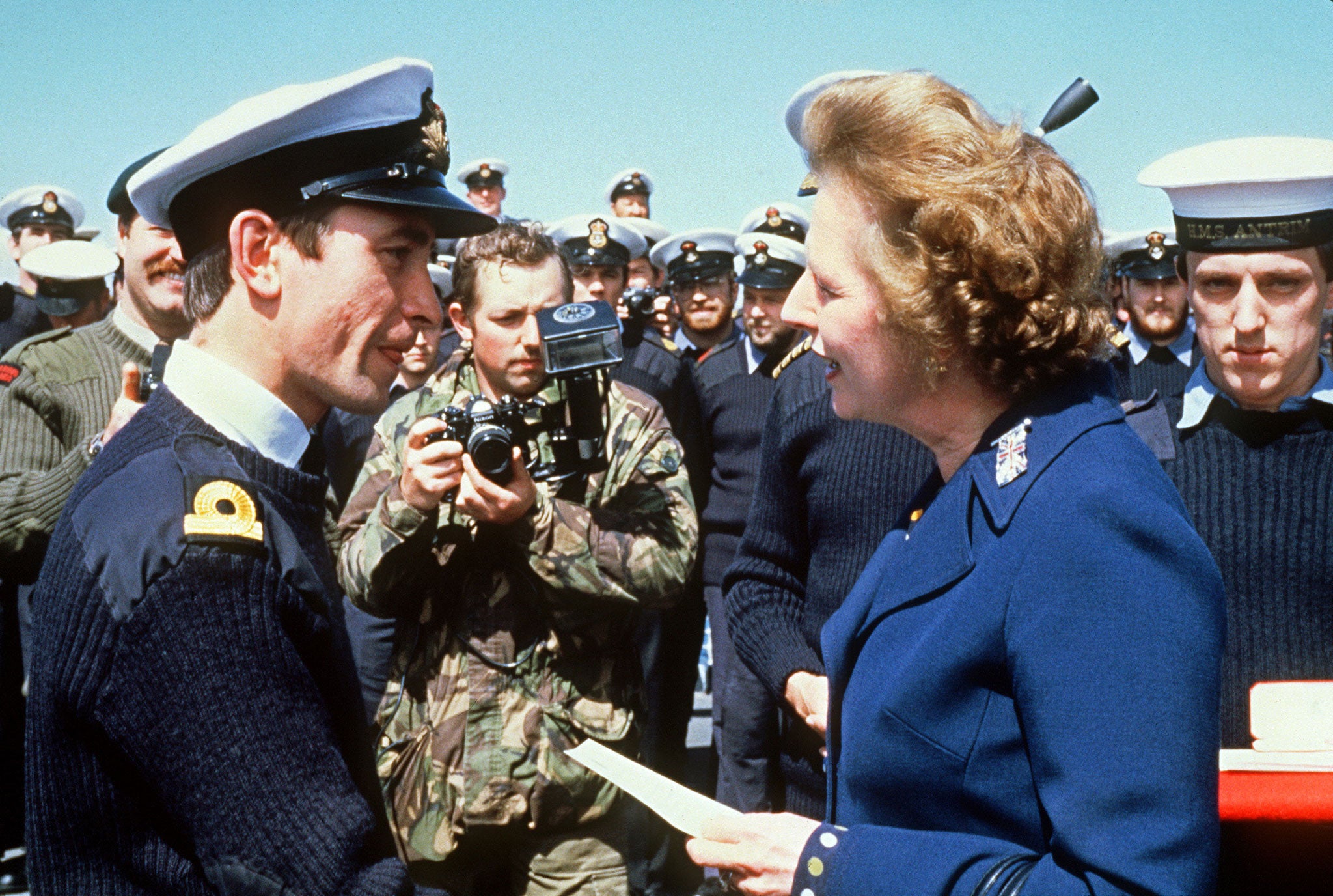 British Prime Minister Margaret Thatcher meets personnel aboard the HMS Antrim 08 January 1983 during her five-day visit to the Falkand Islands.