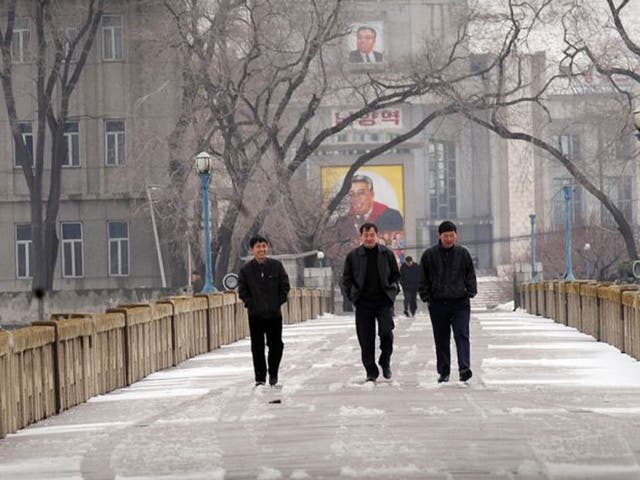 Great Leader’ Kim Il-sung looks down on the Tumen bridge 