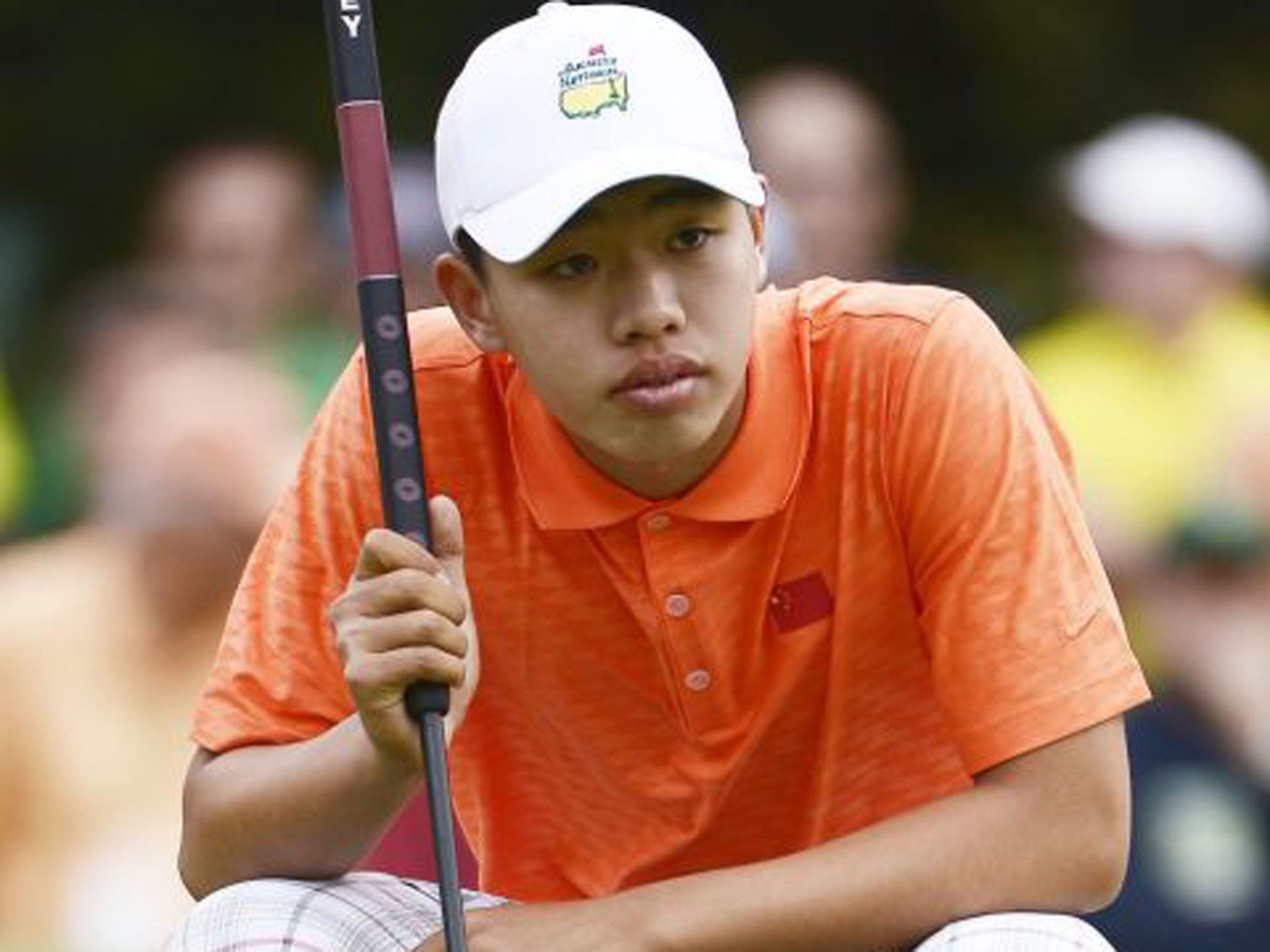 Guan Tianlang finds it tough going at Augusta yesterday