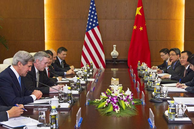 US Secretary of State John Kerry (left) during a meeting in Beijing