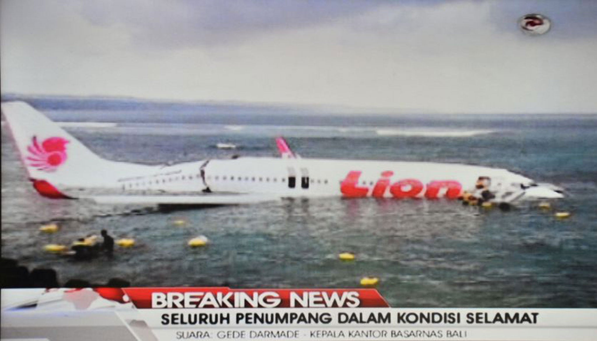 This television grab taken from Indonesia's TV One on April 13, 2013 shows a Lion Air Boeing 737 jet that overshot the runway during landing, sitting in the water at Bali's international airport near Denpasar.