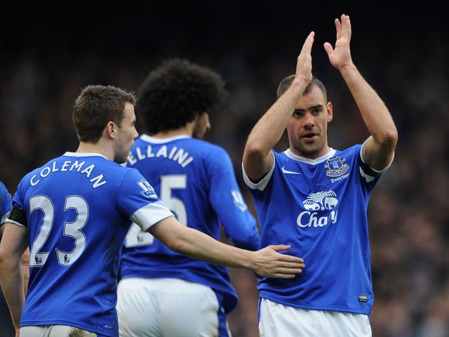  Darron Gibson of Everton is congratulated by his team-mate Seamus Coleman after scoring the opening goal