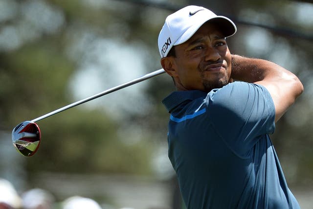 Tiger Woods teed off mired in a rules controversy after taking an incorrect drop on Friday
