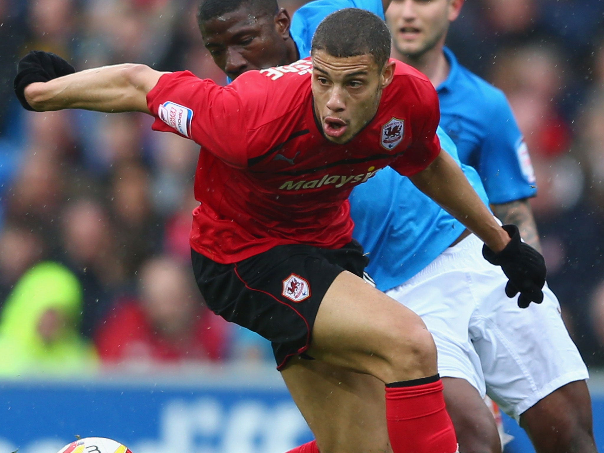 Rudy Gestede’s two goals took Championship leaders, Cardiff City, to the very brink of promotion
