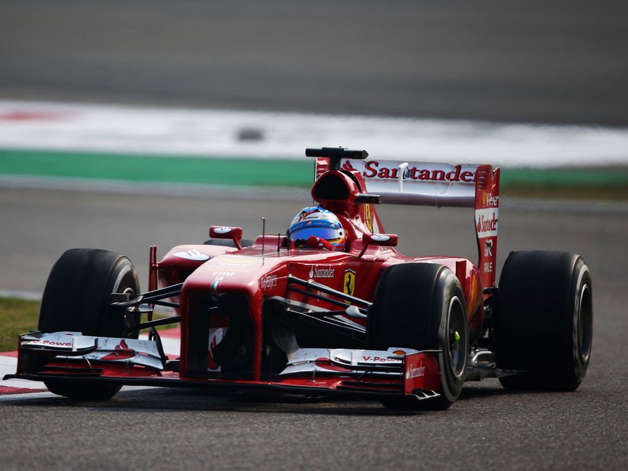 Fernando Alonso of Spain and Ferrari drives during the Chinese Formula One Grand Prix at the Shanghai International Circuit