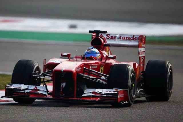 Fernando Alonso of Spain and Ferrari drives during the Chinese Formula One Grand Prix at the Shanghai International Circuit 