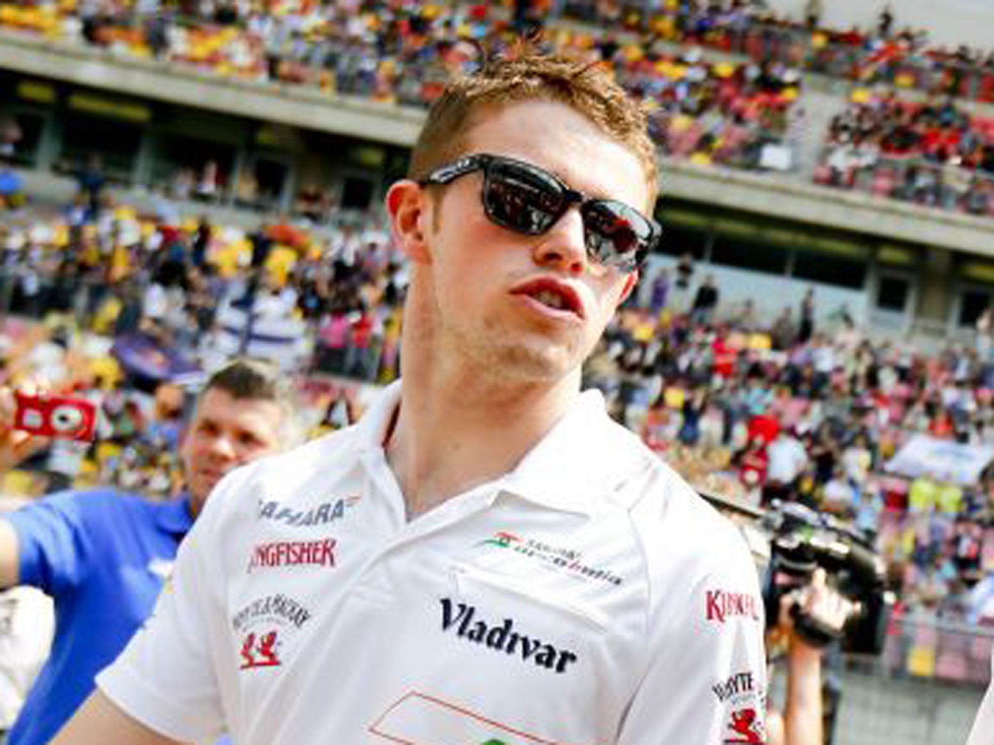 Paul Di Resta survived a first-lap run-in which cost several places