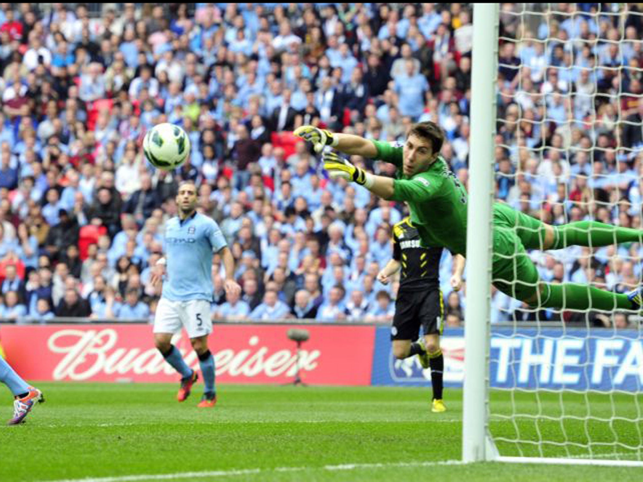 Manchester City’s Costel Pantilimon watches a shot sail wide at Wembley
