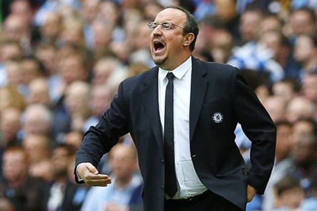 Rafa Benitez urging his players on