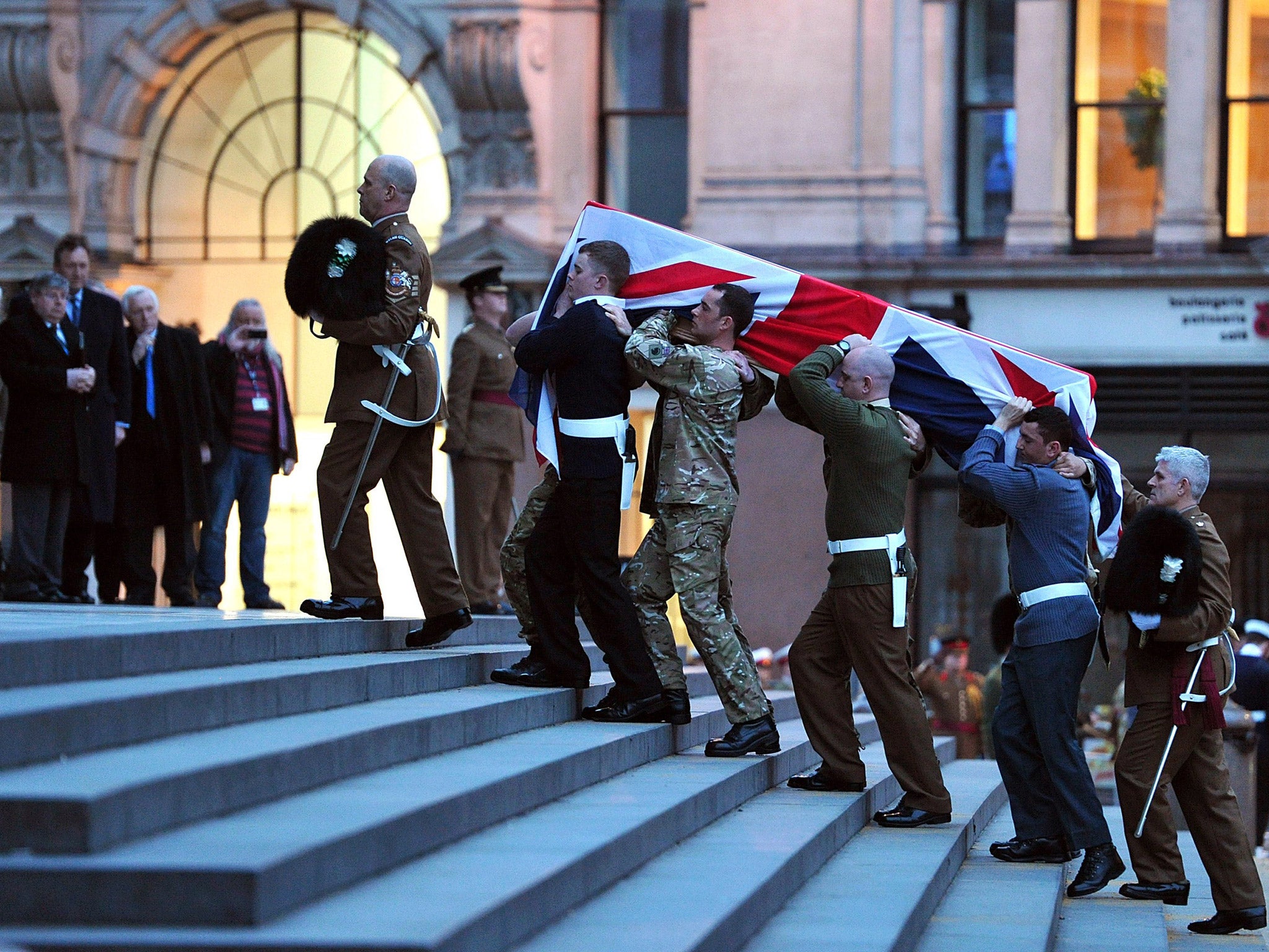 A coffin is carried up the steps of St Paul's Cathedral during a rehearsal for the funeral of former Prime Minister Margaret Thatcher