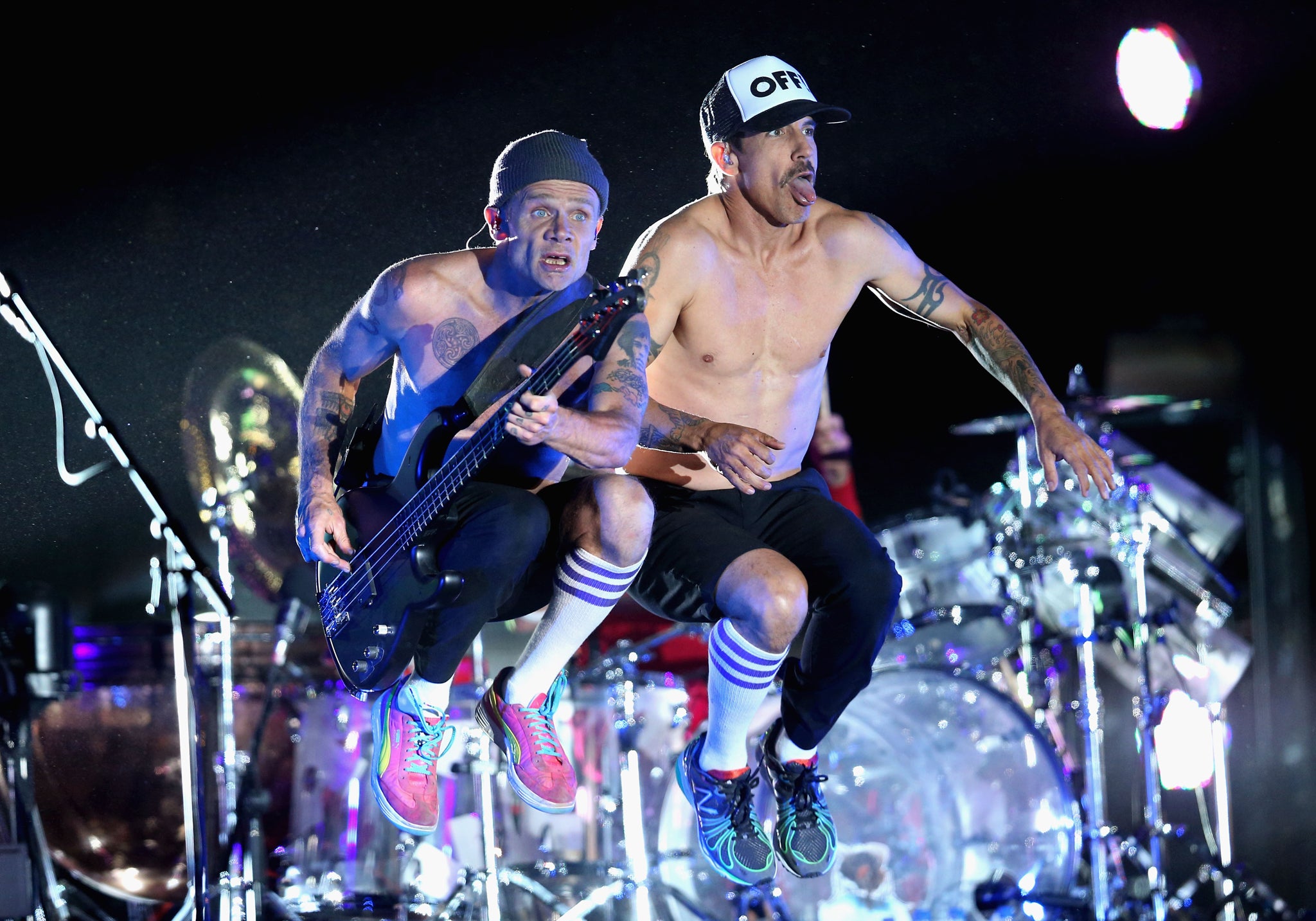 Flea and Anthony Kiedis from the Red Hot Chili Peppers perform on stage