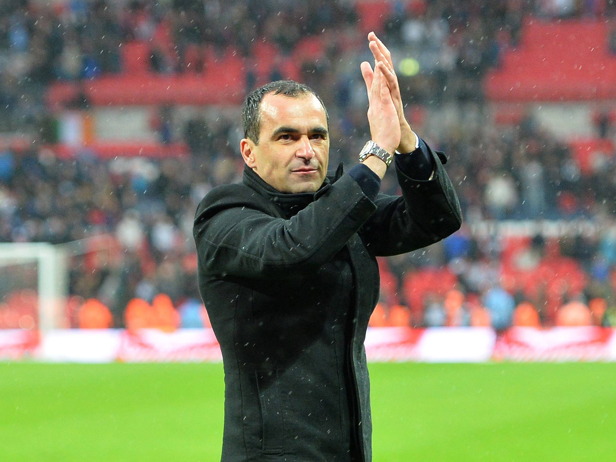 Roberto Martinez salutes the Wigan fan at Wembley