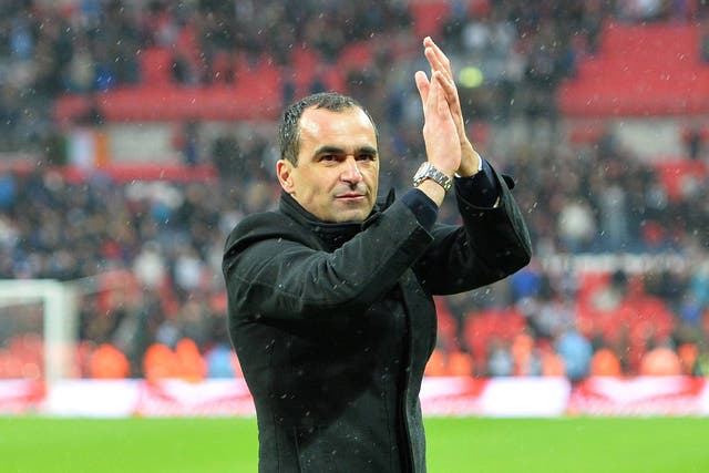 Roberto Martinez salutes the Wigan fan at Wembley