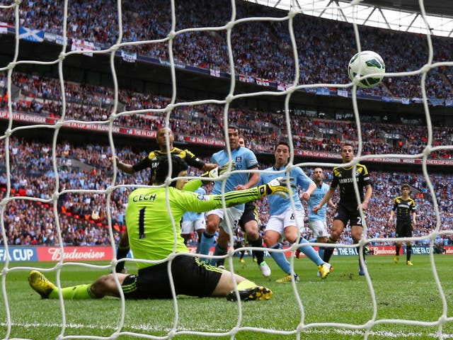 Samir Nasri scores the opening goal at Wembley