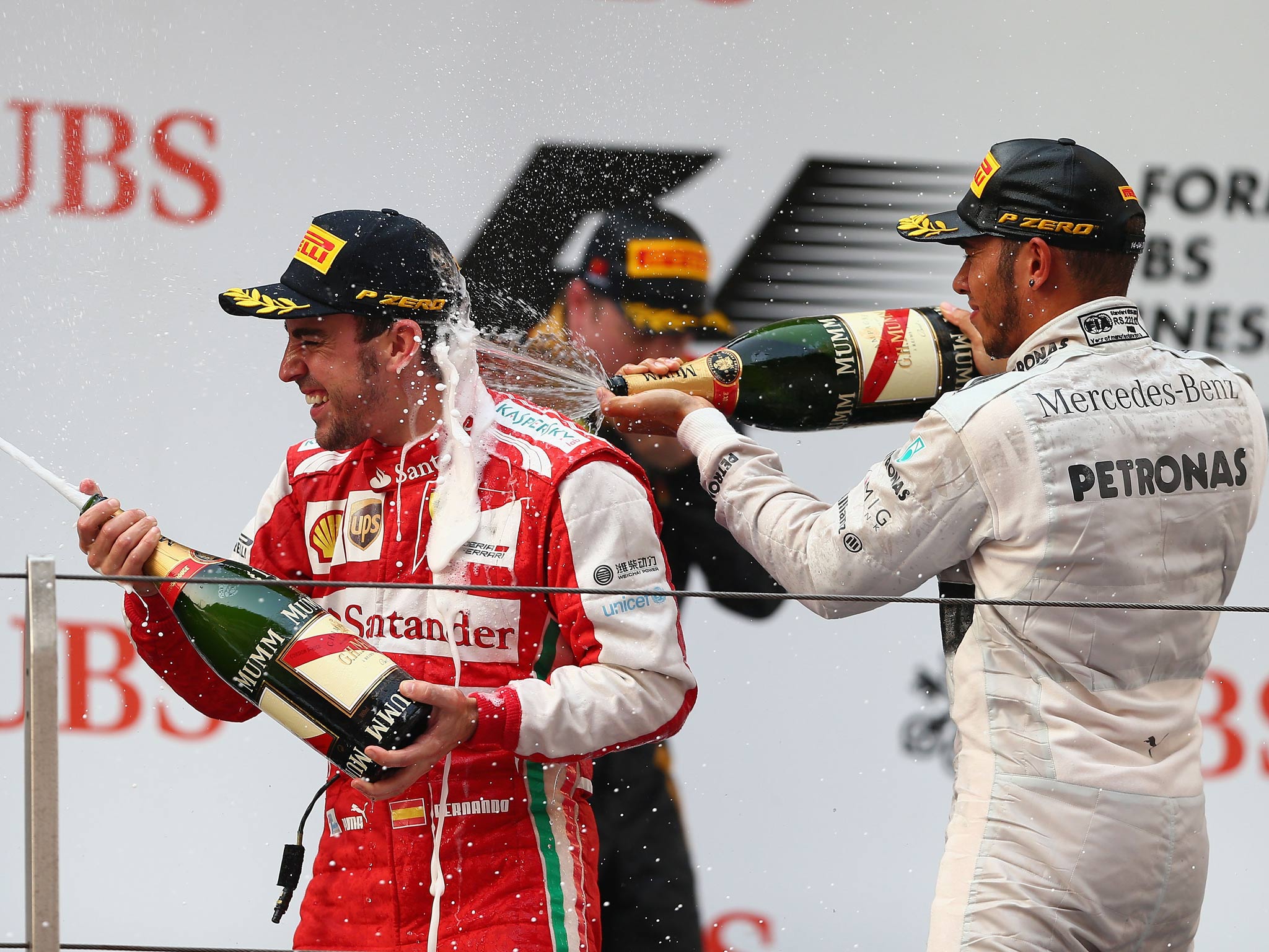 Fernando Alonso celebrates victory at the Chinese Grand Prix